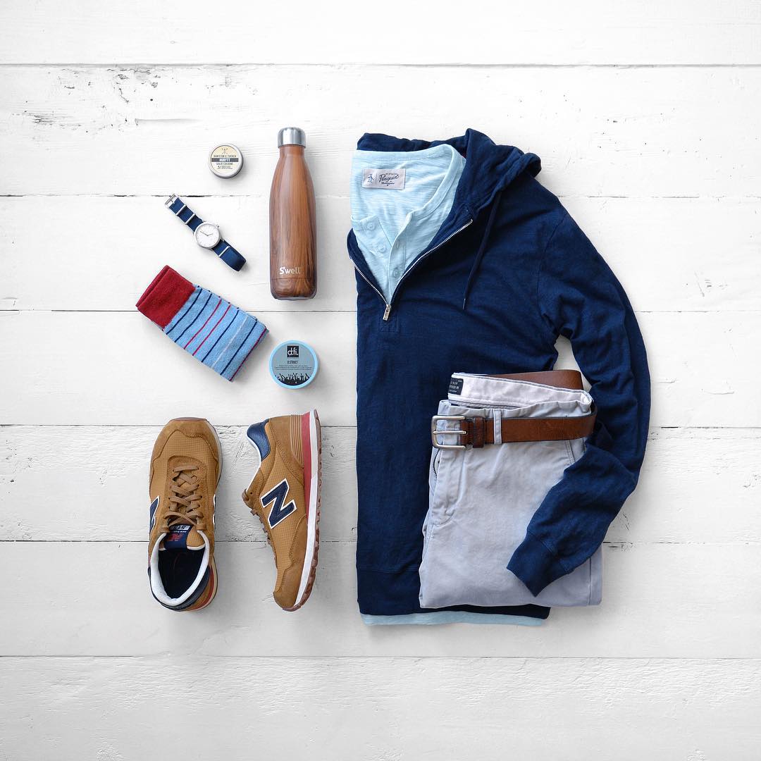Men's casual wear, navy hoodie and New Balance sneakers